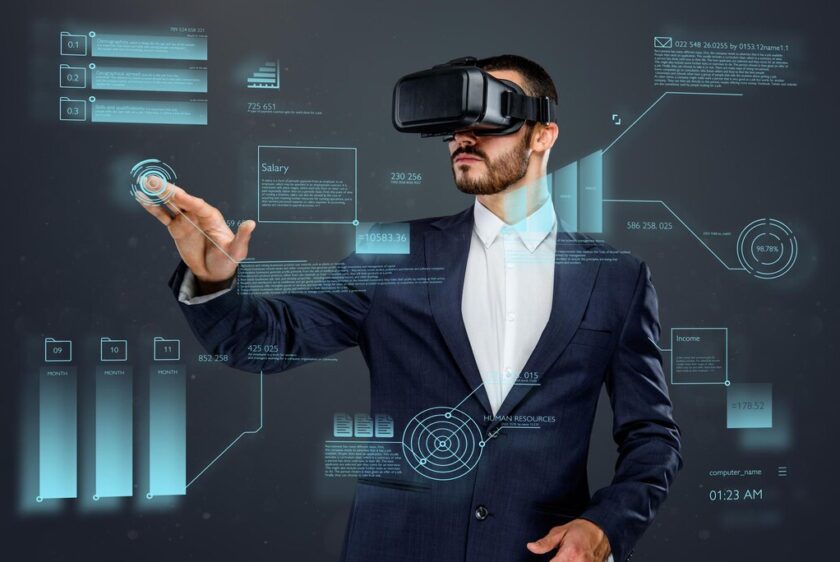 male-suit-with-virtual-reality-glasses-his-head-working-virtual-financial-world_613910-310